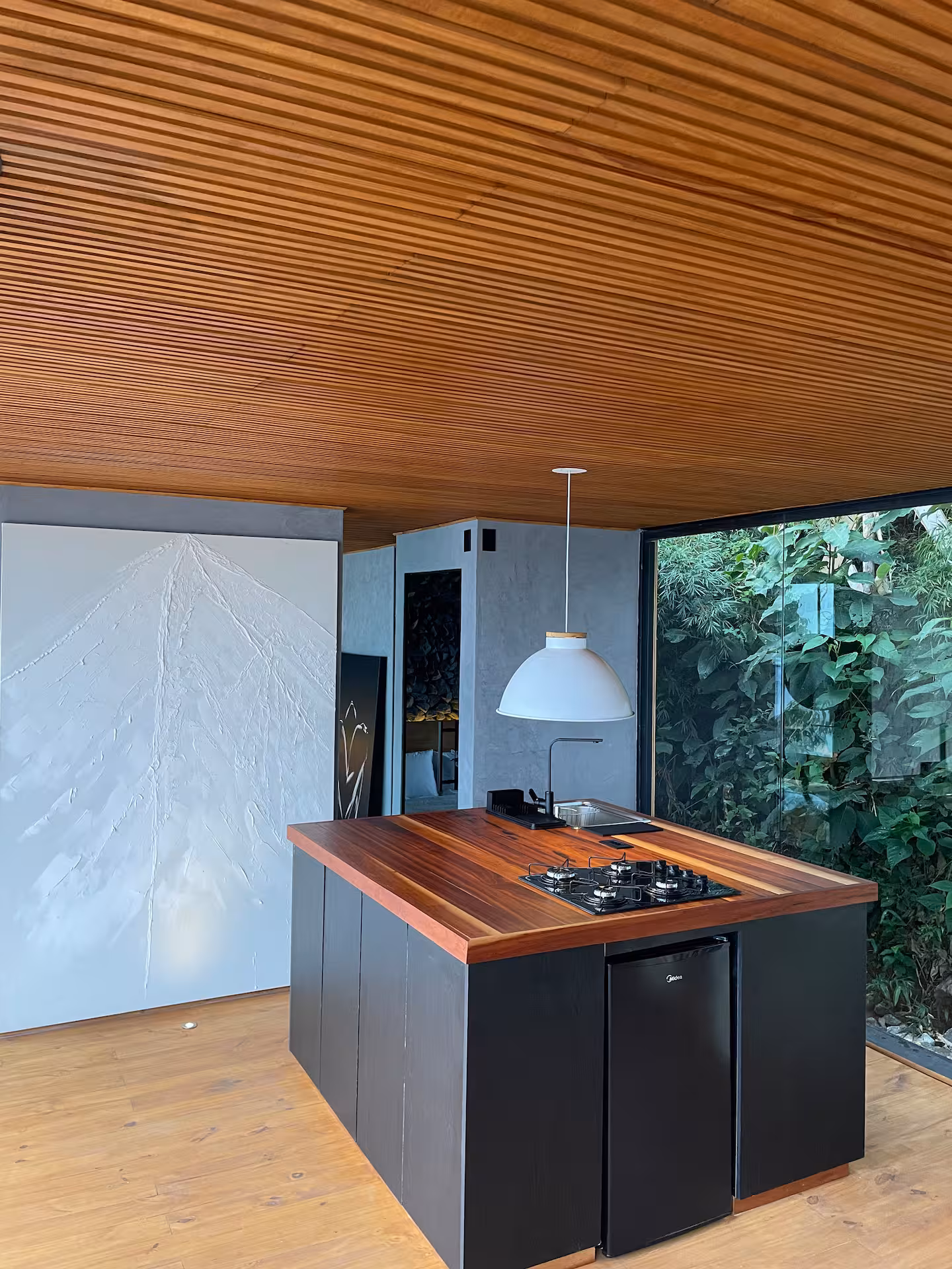 Cozinha completa integrada à sala